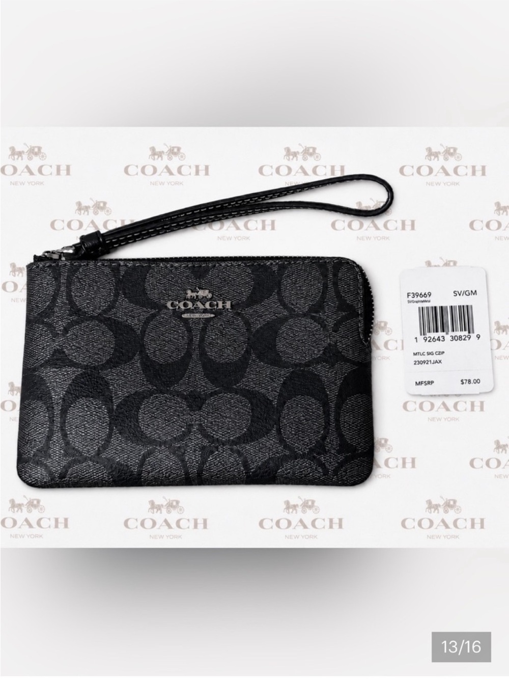 Coach Silver and Gunmetal Canvas
Signature Metallic Zip Wristlet
NWT (F39669)